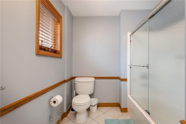 39 Sunnyside Dr, Elmira, NY 14905 - full bath with baseboards, toilet, tile patterned floors, and shower / bath combination with glass door