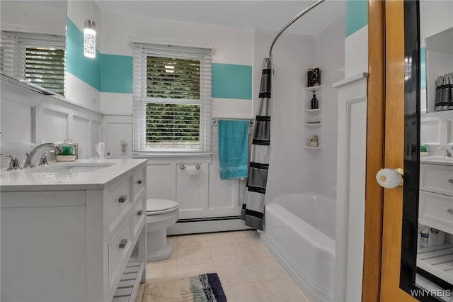 669 Quaker Rd, Aurora, NY 14052 - bathroom with baseboard heating, vanity, plenty of natural light, a wainscoted wall, and a decorative wall