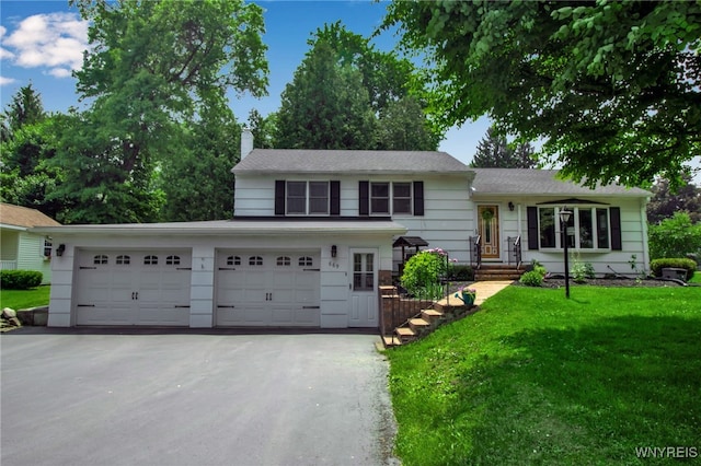 669 Quaker Rd, Aurora, NY 14052 - tri-level home with driveway, a chimney, and a front yard