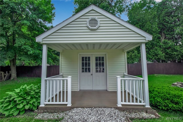 669 Quaker Rd, Aurora, NY 14052 - view of outbuilding with a porch