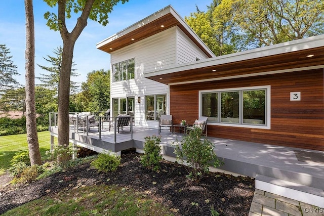 3 Elson Ln, Skaneateles, NY 13152 - back of house featuring a deck