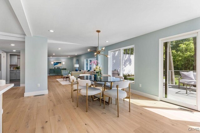 3 Elson Ln, Skaneateles, NY 13152 - dining room with light wood-style flooring, baseboards, recessed lighting, and a chandelier