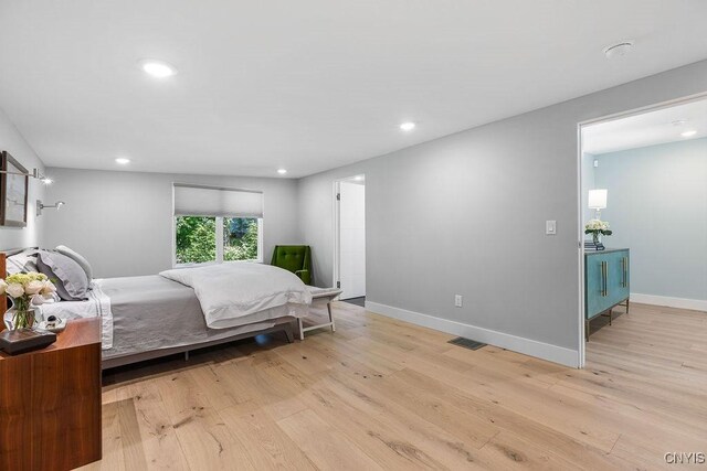 3 Elson Ln, Skaneateles, NY 13152 - bedroom with light wood-style flooring, recessed lighting, and baseboards