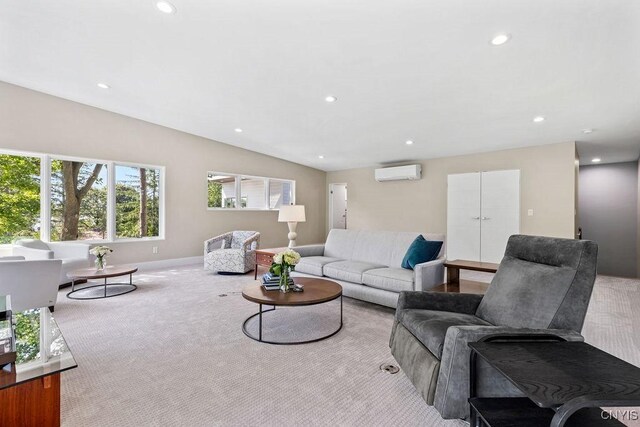3 Elson Ln, Skaneateles, NY 13152 - carpeted living room featuring a wall mounted air conditioner, recessed lighting, lofted ceiling, and baseboards