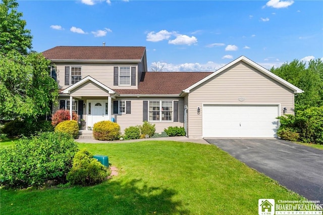 7080 Goodrich Rd, Clarence, NY 14032 - view of front of home featuring asphalt driveway, an attached garage, a front yard, and a shingled roof