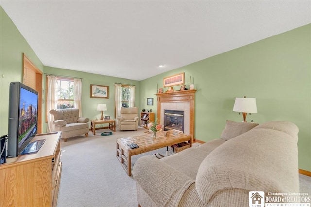 7080 Goodrich Rd, Clarence, NY 14032 - living room with carpet, a fireplace, and baseboards