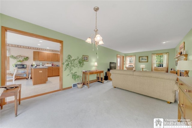7080 Goodrich Rd, Clarence, NY 14032 - living area with light carpet and baseboards