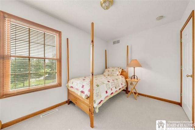 7080 Goodrich Rd, Clarence, NY 14032 - bedroom featuring carpet and baseboards