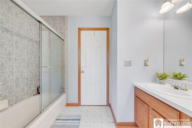 7080 Goodrich Rd, Clarence, NY 14032 - bathroom with vanity, combined bath / shower with glass door, tile patterned floors, and baseboards