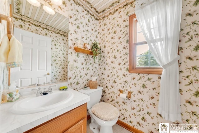 7080 Goodrich Rd, Clarence, NY 14032 - half bathroom with wallpapered walls, toilet, vanity, and baseboards