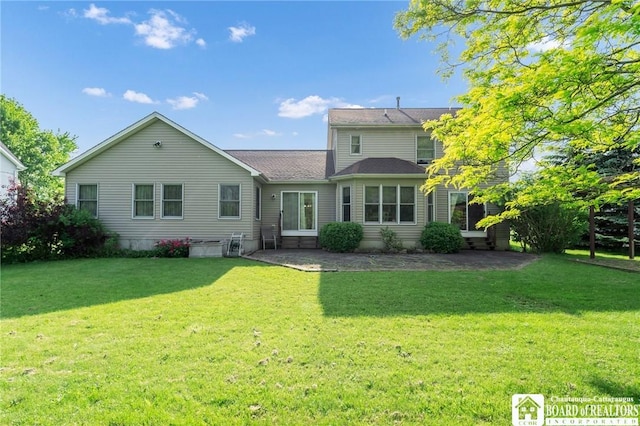 7080 Goodrich Rd, Clarence, NY 14032 - rear view of property with a lawn, a patio, and roof with shingles