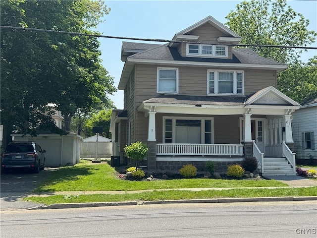 61 2nd St, German Flatts, NY 13357 - american foursquare style home with a porch, a shingled roof, and driveway