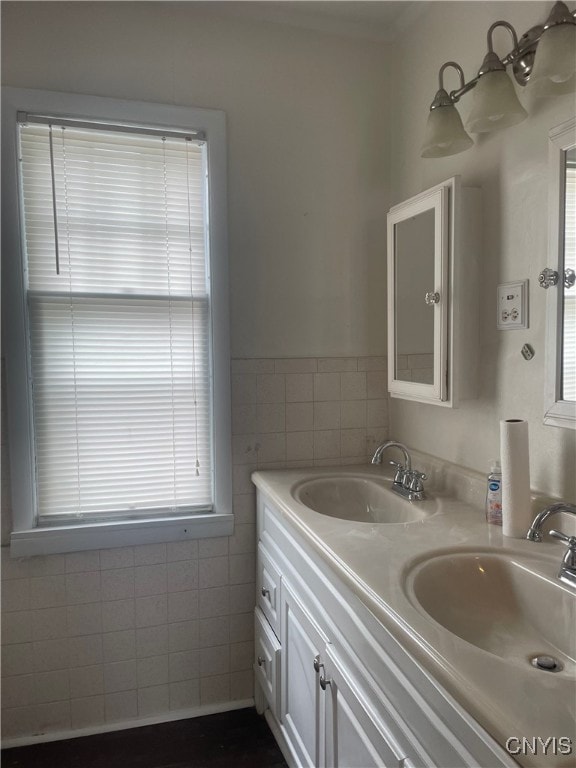 61 2nd St, German Flatts, NY 13357 - bathroom with double vanity and tile walls