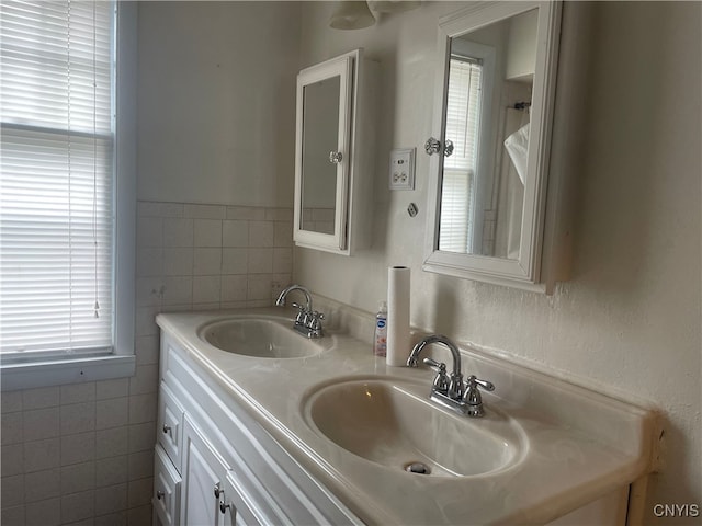 61 2nd St, German Flatts, NY 13357 - bathroom with tile walls and double vanity