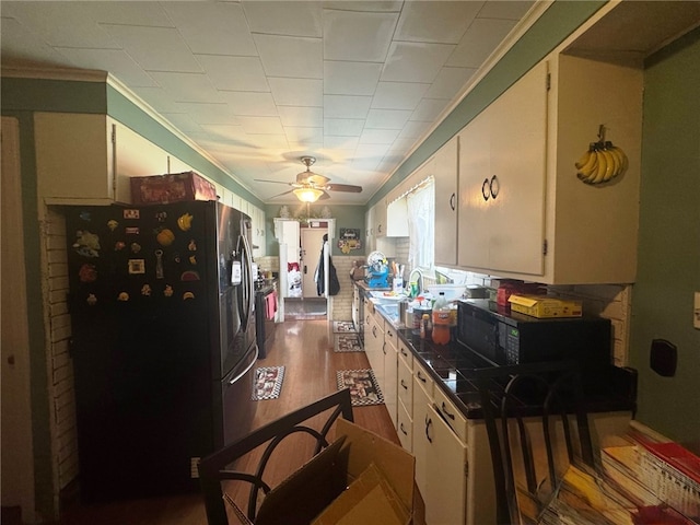 14 Park St, Bradford-City, PA 16701 - kitchen with stainless steel fridge, ornamental molding, black microwave, a ceiling fan, and dark wood-style floors