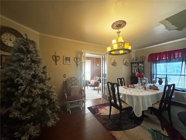 14 Park St, Bradford-City, PA 16701 - dining space with wood finished floors, ornamental molding, and a chandelier