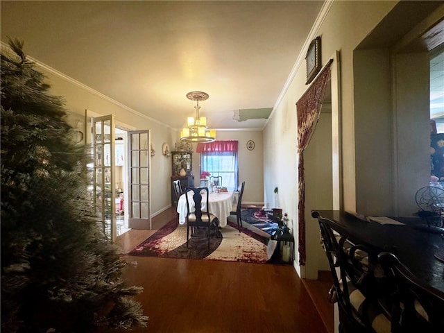 14 Park St, Bradford-City, PA 16701 - dining area featuring a chandelier, wood finished floors, and crown molding