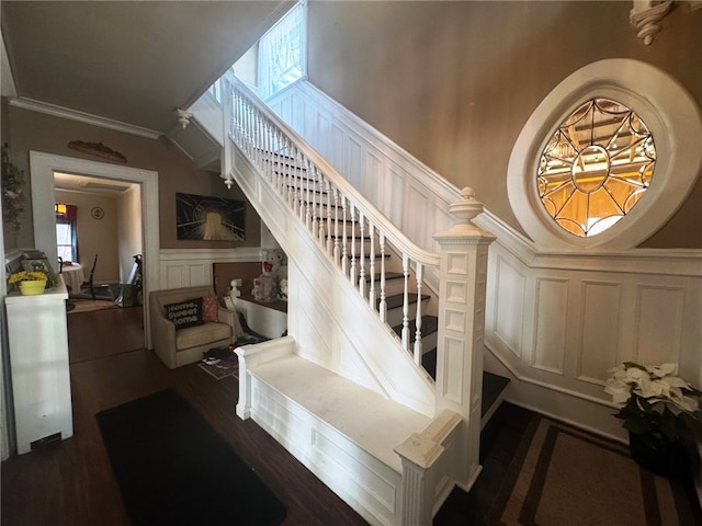 14 Park St, Bradford-City, PA 16701 - stairs with a decorative wall, wainscoting, wood finished floors, ornamental molding, and healthy amount of natural light
