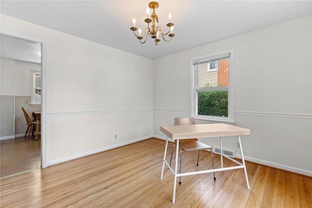 55 Heberton Rd, Irondequoit, NY 14622 - office with a chandelier, wood finished floors, and baseboards