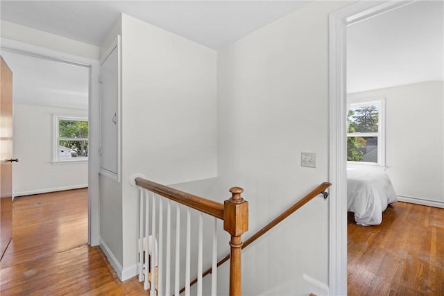 55 Heberton Rd, Irondequoit, NY 14622 - hall with an upstairs landing, wood finished floors, and baseboards