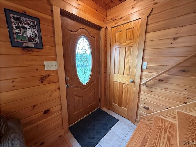 25003 State Route 37, Pamelia, NY 13601 - foyer with wood walls and light tile patterned flooring