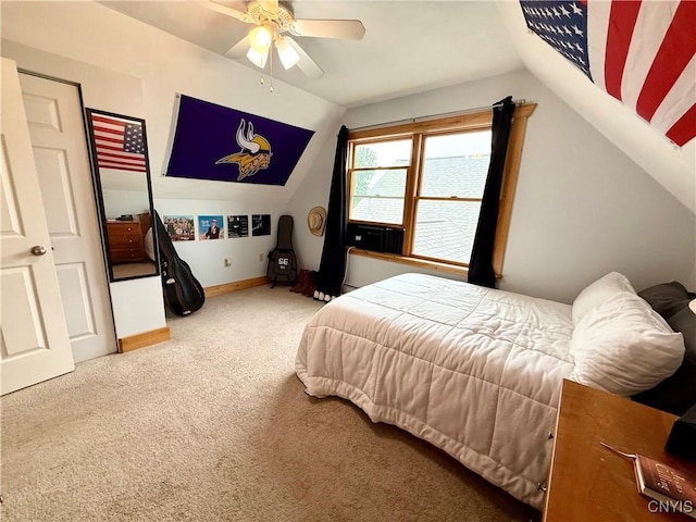 25003 State Route 37, Pamelia, NY 13601 - carpeted bedroom with vaulted ceiling, baseboards, and ceiling fan