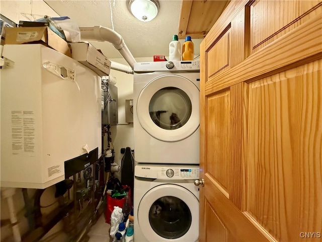 25003 State Route 37, Pamelia, NY 13601 - laundry area featuring stacked washer / dryer