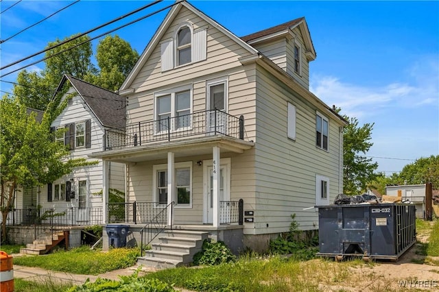 614 20th St, Niagara Falls, NY 14301 - american foursquare style home with a balcony and covered porch