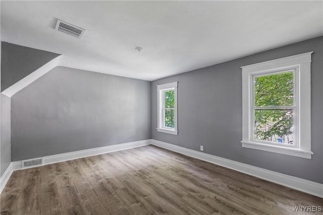 610 20th St, Niagara Falls, NY 14301 - additional living space featuring wood finished floors and baseboards