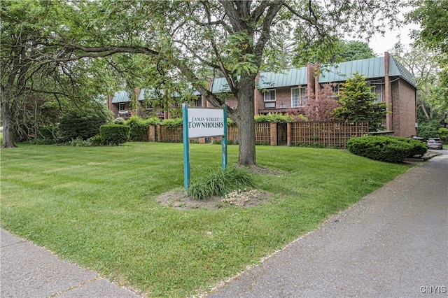 1215-29 James St, Syracuse, NY 13203 - community / neighborhood sign featuring a yard