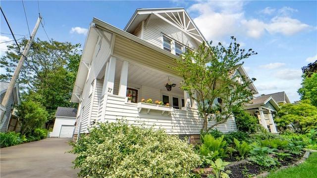 17 Varden St, Rochester, NY 14609 - view of front facade featuring an outdoor structure and a detached garage