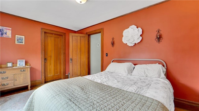 17 Varden St, Rochester, NY 14609 - bedroom with baseboards, wood finished floors, and a closet