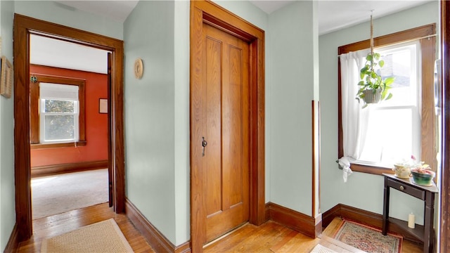 17 Varden St, Rochester, NY 14609 - entryway featuring baseboards and light wood-style floors