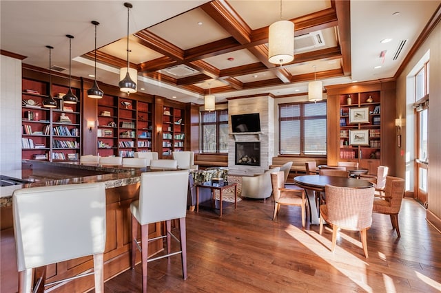 247 Bretlyn Cir, Brighton, NY 14618 - bar area featuring crown molding, wood finished floors, coffered ceiling, beamed ceiling, and pendant lighting