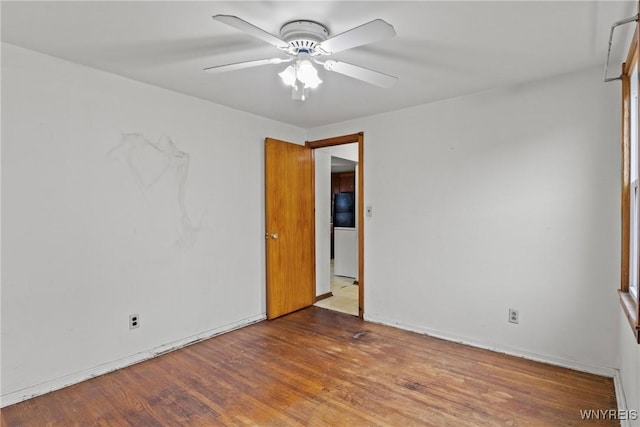 99 Kamper Ave, Buffalo, NY 14210 - spare room with wood finished floors, a ceiling fan, and baseboards