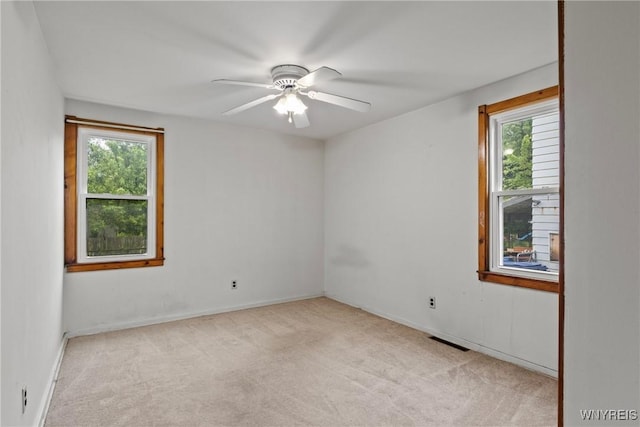 99 Kamper Ave, Buffalo, NY 14210 - carpeted empty room with a ceiling fan and baseboards