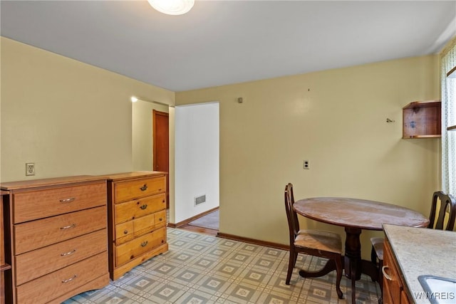 99 Kamper Ave, Buffalo, NY 14210 - dining area featuring baseboards and light floors