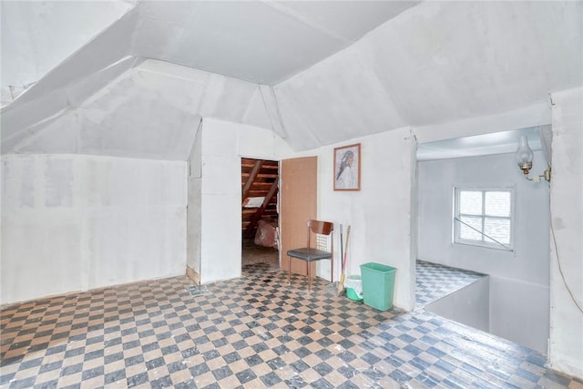135 Cameron St, Rochester, NY 14606 - additional living space with tile patterned floors and vaulted ceiling