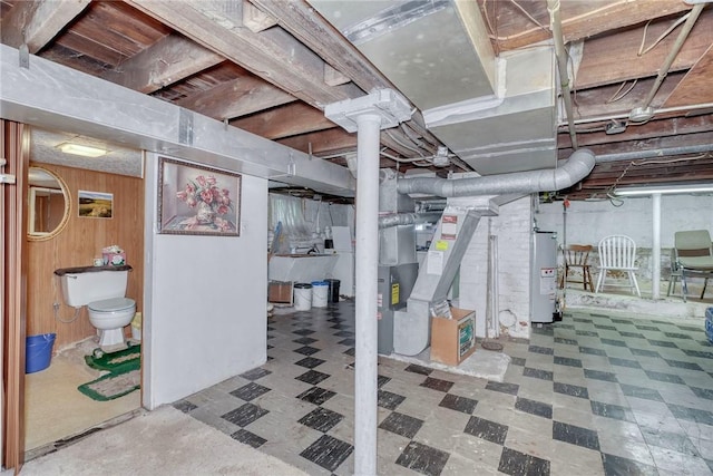 135 Cameron St, Rochester, NY 14606 - unfinished below grade area featuring tile patterned floors, water heater, and heating unit
