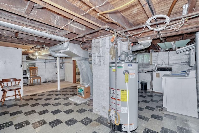 135 Cameron St, Rochester, NY 14606 - unfinished below grade area with gas water heater, independent washer and dryer, and tile patterned floors