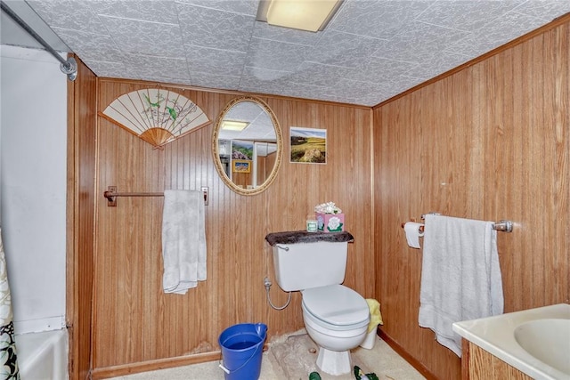 135 Cameron St, Rochester, NY 14606 - bathroom with an ornate ceiling, wooden walls, toilet, and a bathtub