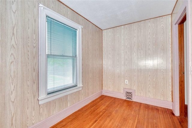 135 Cameron St, Rochester, NY 14606 - unfurnished room with wood finished floors and baseboards