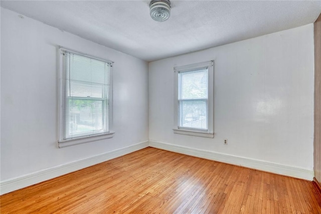 135 Cameron St, Rochester, NY 14606 - unfurnished room with light wood-style floors and baseboards
