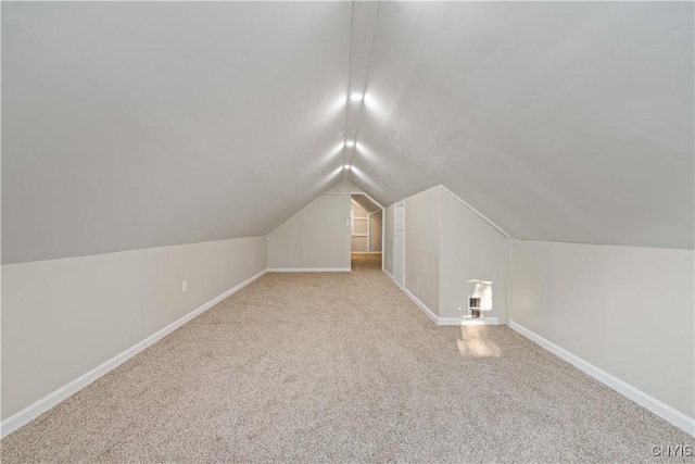 124 Aurora St, Rochester, NY 14621 - additional living space with carpet floors, lofted ceiling, and baseboards