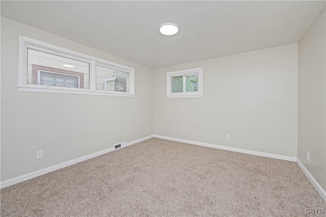 124 Aurora St, Rochester, NY 14621 - spare room featuring carpet and baseboards