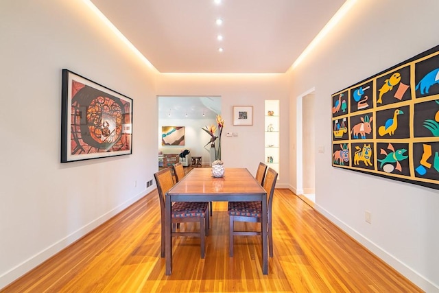 313 Pelham Rd, Brighton, NY 14610 - dining room with light wood finished floors and baseboards