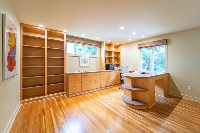 313 Pelham Rd, Brighton, NY 14610 - office area featuring light wood finished floors, recessed lighting, baseboards, and built in shelves