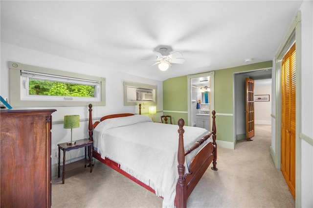 15205 W Lake Rd, Pulteney, NY 14418 - bedroom featuring light carpet, a ceiling fan, and connected bathroom
