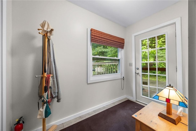 15205 W Lake Rd, Pulteney, NY 14418 - doorway to outside featuring dark tile patterned floors and baseboards
