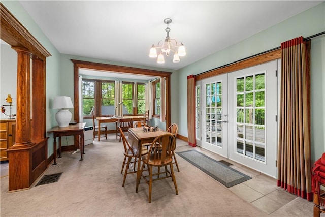 15205 W Lake Rd, Pulteney, NY 14418 - dining area featuring french doors, a chandelier, healthy amount of natural light, and carpet